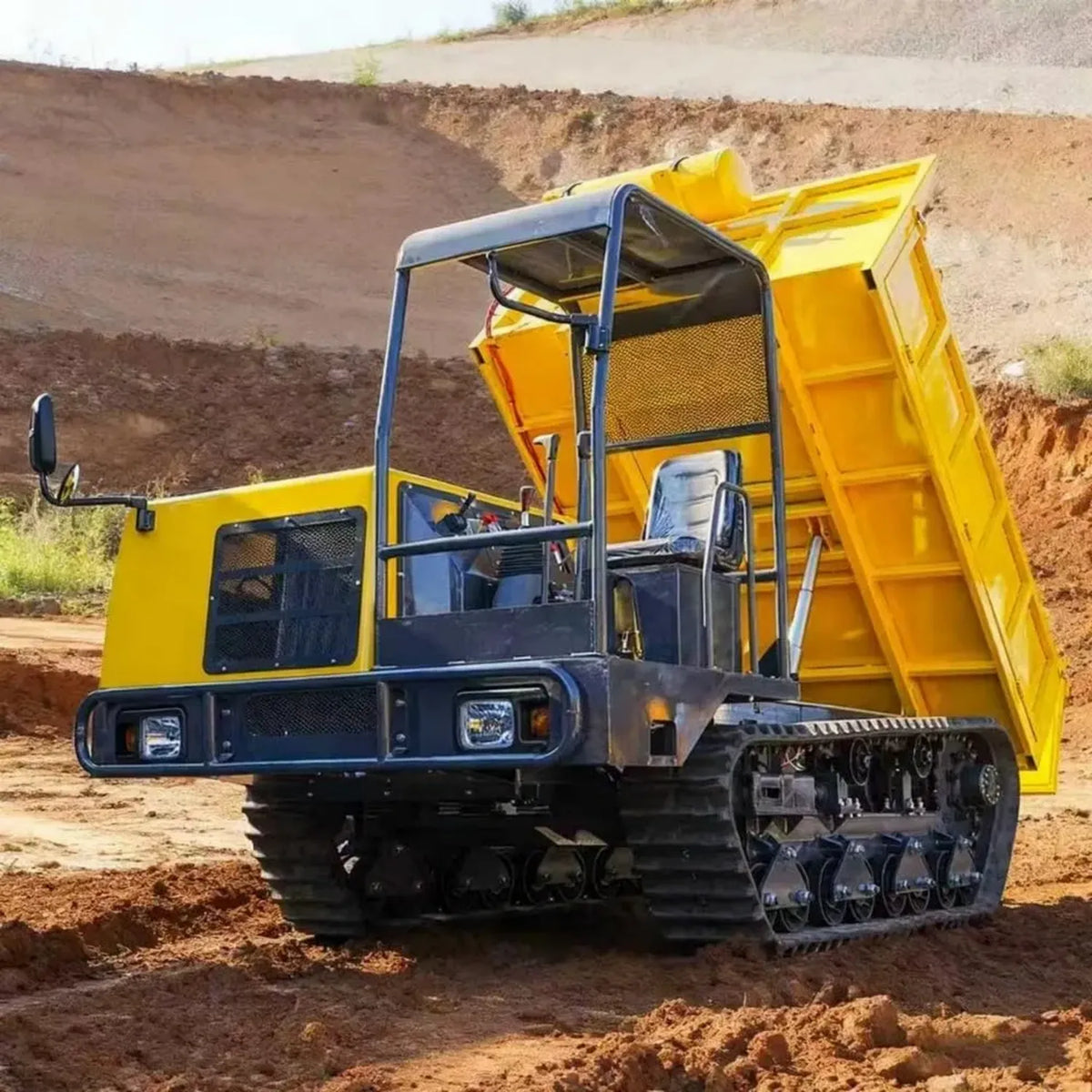 Veicolo industriale cingolato con cassone ribaltabile automatizzato, capacità di carico 1-6 tonnellate